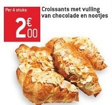 Promotions Croissants met vulling van chocolade en nootjes - Produit maison - Match - Valide de 23/01/2013 à 29/01/2013 chez Match Food & More
