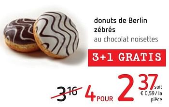 Promoties Donuts de berlin zébrés au chocolat noisettes - Huismerk - Eurospar - Geldig van 06/10/2016 tot 19/10/2016 bij Eurospar (Colruytgroup)