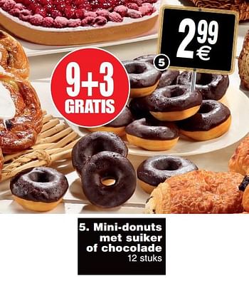 Promotions Mini-donuts met suiker of chocolade - Produit maison - Cora - Valide de 23/07/2019 à 29/07/2019 chez Cora