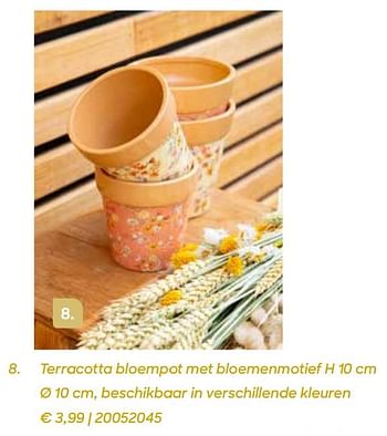Promotions Terracotta bloempot met bloemenmotief - Produit Maison - Ava - Valide de 04/03/2022 à 31/07/2022 chez Ava