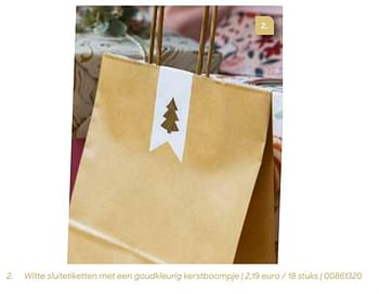 Promoties Witte sluitetiketten met een goudkleurig kerstboompje - Huismerk - Ava - Geldig van 24/10/2023 tot 31/12/2023 bij Ava