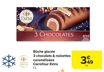 Promotions Bûche glacée 3 chocolats + noisettes caramélisées carrefour extra - Produit maison - Carrefour  - Valide de 29/11/2023 à 01/01/2024 chez Carrefour