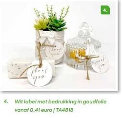 Wit label met bedrukking in goudfolie