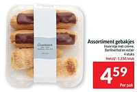 Assortiment gebakjes hoorntje met crème, berlinerbol en eclair-Huismerk - Intermarche